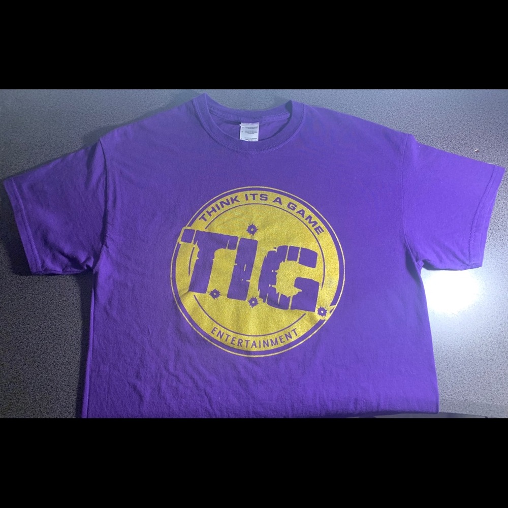 OFFICIAL “Think It’s a Game” (TIG Records) Tee.